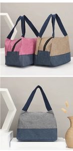 Detailansicht der geräumigen Canvas-Tragetaschen mit zweifarbigem Design und Reißverschluss