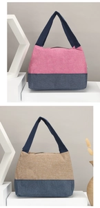 Detailansicht der kontrastierenden Canvas-Taschen mit robusten Griffen und festem Stoffgewebe