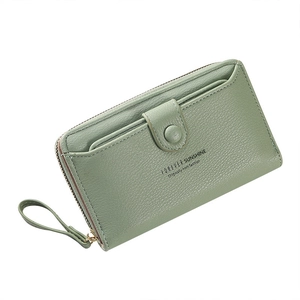 Sage green long faux leather wristlet wallet with zipper and snap closure detail