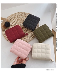 Group shot of quilted PU leather mini wallets with zipper closure in various colors