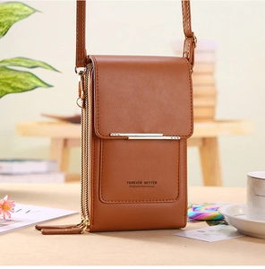 Sac à bandoulière marron pour téléphone avec trois zips dorés et barre décorative métal