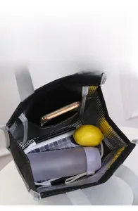 Top view of large capacity insulated lunch bag with aluminum foil lining and interior pocket