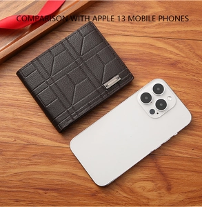 Men's brown leather bifold wallet with plaid texture compared to a mobile phone size