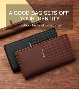 Macro detail of men's long wallet showing woven texture and smooth leather finish