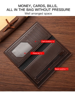 Detail of dark brown leather wallet showing 4 card slots, photo window and zipper pocket
