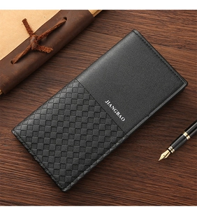 Detail of black woven leather long wallet with zipper and business accessories