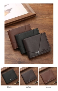 Detail of bifold men's wallets with twill stitching, metal corners, and embossed logo