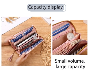 Detail view of pink leather long wallet showing multi-card slots and gold tassel zipper