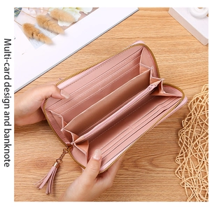 Pink PU leather long wallet detail showing multi-card slots and secure zipper interior