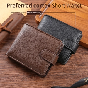 Close-up of brown and black leather short wallets featuring high-quality lychee texture