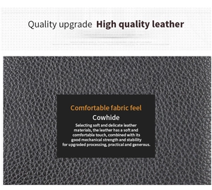 Macro detail of high quality black cowhide leather with soft texture and lychee pattern