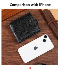 Men's compact PU leather wallet shown next to an iPhone for size comparison