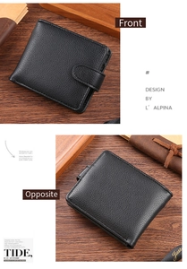 Macro view of black lychee grain leather wallet with snap closure and stitching details