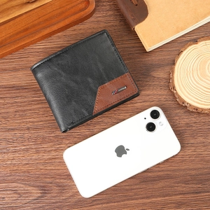 Portefeuille bicolore pour homme en cuir grainé avec empiècement marron et logo métal