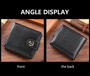 Detail of men's black crocodile embossed leather wallet with silver metal snap closure
