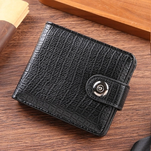 Close-up of black PU leather wallet with crocodile pattern and metal snap fastener