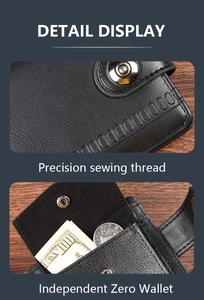Detail display of black lychee leather wallet featuring precision stitching and coin pocket