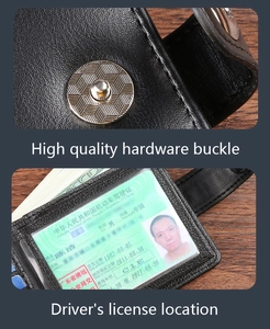 Detail of black leather wallet showing metal snap closure and clear ID window for license