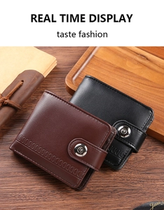 Close-up of horizontal bi-fold wallets in black and brown PU leather on wood surface