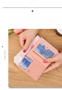 Pink lychee grain leather wallet detail with photo slot, change pocket and card holders