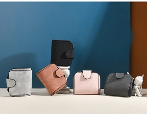Detail showing various colors of women's short flip wallets with premium matte finish