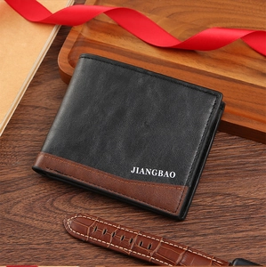 Close-up of men's bifold wallet with contrast stitching and premium leather texture