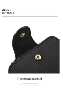 Close-up of matte black leather wallet featuring a round golden metallic magnetic buckle