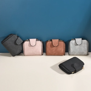 Short vintage women wallet in matte leather texture featuring multiple card slots and zipper