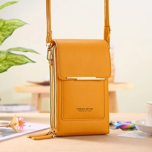 Ginger yellow crossbody phone bag in synthetic leather with adjustable strap and dual zippers