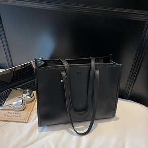 Large vintage black tote bag in premium faux leather for professional office commute use