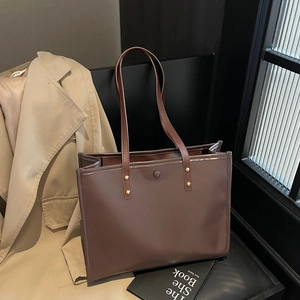 Retro large capacity dark brown leather tote bag with gold rivets for daily commute