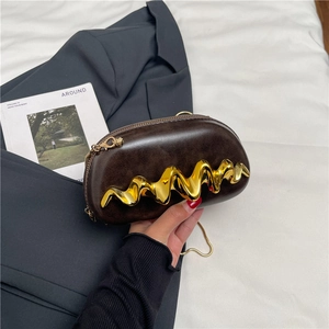 Modern dark brown oval clutch bag with wavy gold metal accent and chain strap