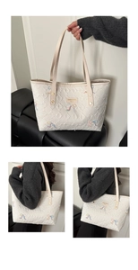 Detailed quilted tote bag with embroidered bows and brand tag shown in various views
