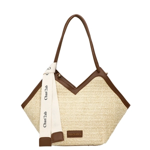 Large capacity woven straw tote bag with brown leather trim and V-shaped opening