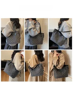 Vues multiples d'un grand sac cabas gris à pois avec lanières en cuir et cordons latéraux