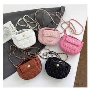 Detailed view of quilted chain bags with elegant gold flower buckles in five colors