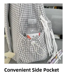 Close-up of the convenient side pocket with adjustable drawstring for water bottles