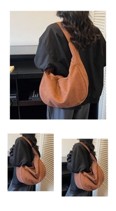 Detail of caramel hobo bag featuring spacious design and premium washed canvas texture