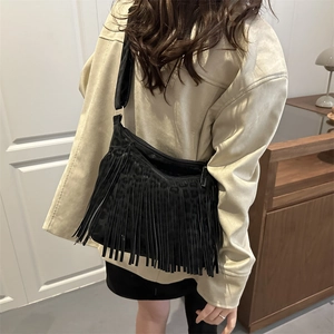 Retro black crossbody bag for women with tassel fringe and leopard print accents