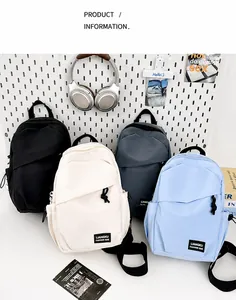 Mini sacs à dos minimalistes en nylon imperméable en quatre couleurs sur panneau