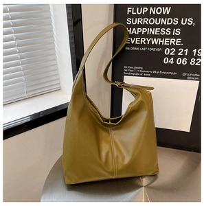 Detailed view of olive green Hobo bag with visible stitching and adjustable metal buckle