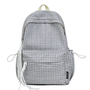 Classic plaid college backpack with large capacity and decorative drawstrings on white background