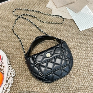 Quilted black crescent leather bag with white camellia buckle and chain strap