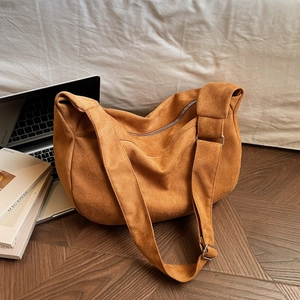 Brown suede slouchy hobo bag with adjustable wide strap for daily office and casual use