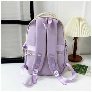 Light purple student backpack with padded shoulder straps and adjustable buckles