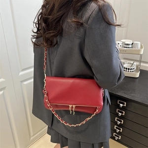 Deep red lychee textured leather chain bag with double zippers and gold hardware