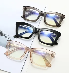 Three oversized acetate eyeglass frames showing metal core temples and blue light lenses