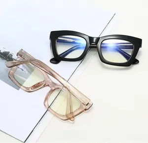 Detail of trendy rectangle glasses frames with blue light blocking lenses and glossy finish