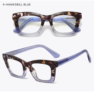 Detail of square glasses frame with hawksbill texture and transparent blue lower part