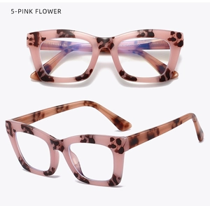 Detailed close-up of pink flower tortoise shell eyeglass frames with size 47-21-145